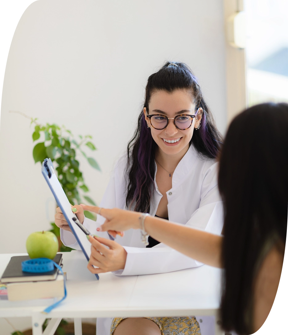 Patient looking at nutritional resources with doctor in orlando