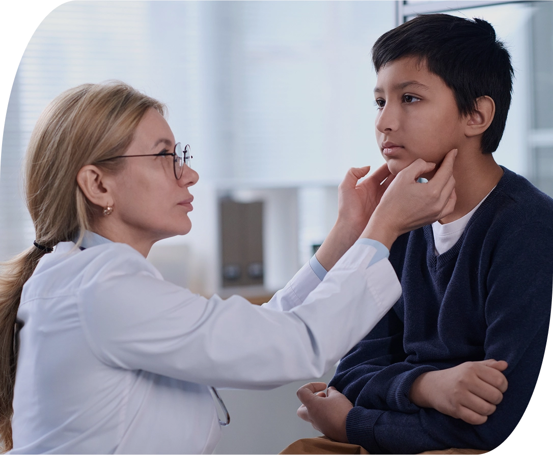 Chiropractor TMJ doctor working on children with TMJ treatments