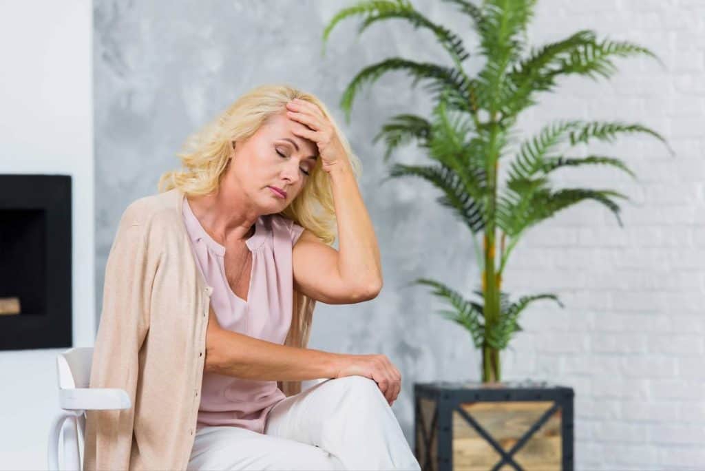 an old women having headache