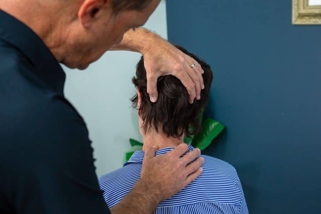 Patient receiving neck pain treatment in Orlando