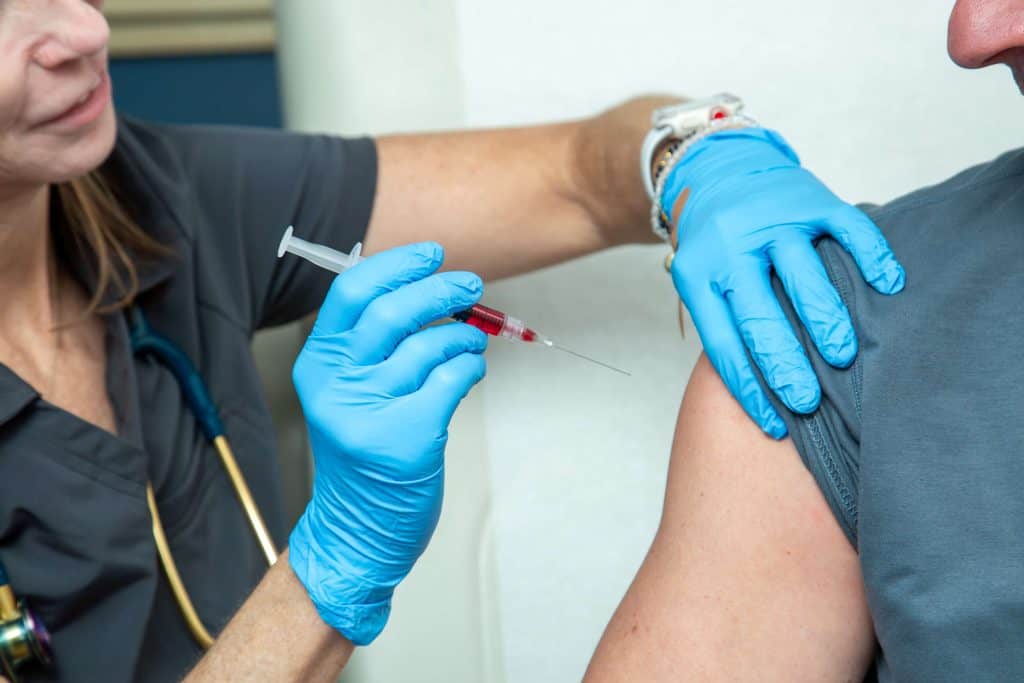 Doctor treating patient with injectables in Orlando, FL